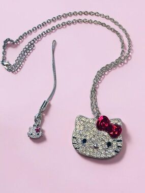 Sanrio Hello Kitty Red Bow Crystal Face Necklace & cute phone accessory